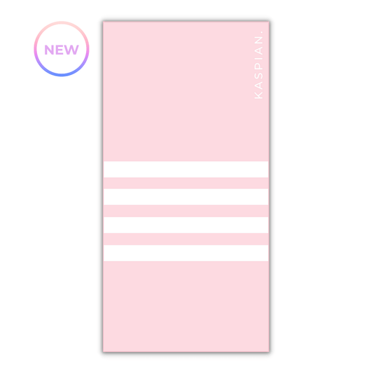Pink towel with white stripes and 'Kaspan' branding on a white background